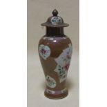 An 18th century Chinese famille rose vase and cover for the Batavian market, 28cm high