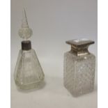 A silver mounted cut glass scent bottle with stopper, early 20th century, 13cm high; and one other