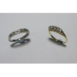 A five stone diamond ring set in white and yellow metal stamped '18ct & Pt', size N, together with a