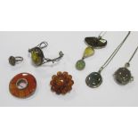 A group of gemset jewellery to include a banded agate brooch, a labradorite pendant, amber etc