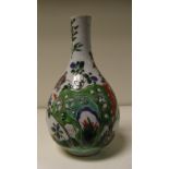 An 18th century Chinese famille verte bottle vase, 16cm (6.25 in) high  The rim has been ground down