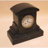 A late Victorian black marble mantle clock