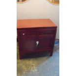 A 20th century Chinese red lacquer cabinet, 77 x77 x 49.5cm (30.25 x 30.25 x 19.5 in)