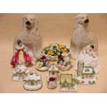 A pair of Staffordshire flatback pottery spaniel figures, together with five porcelian pastel