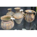 Five archaic style terracotta vases with geometric decoration