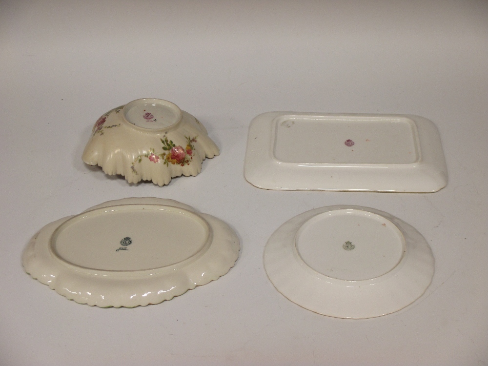 A Royal Worcester shell shaped bowl decorated with flowers, puce mark 12 dots, 19cm long, and - Image 2 of 2