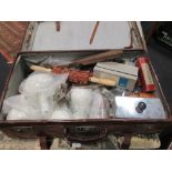 A quantity of medical items in a large leather suitcase