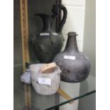 A Roman pottery oil lamp, a Grand Tour bronze ewer and other items including an 18th century bottle