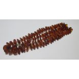 A graduated amber chip bead necklace, length 78cm, 45g