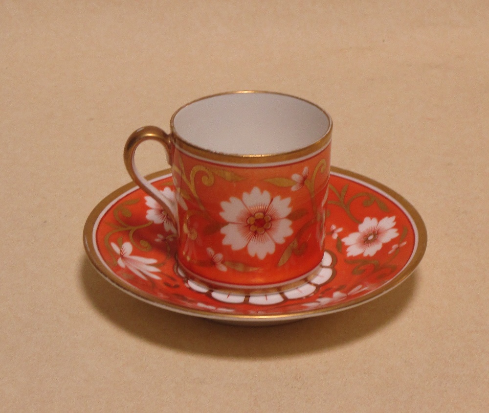 A cabinet cup and saucer comprising of a Spode cup and matched saucer by Coalport