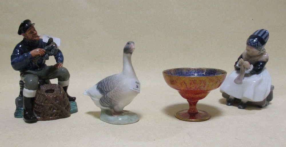 A Royal Copenhagen porcelain goose, together with a Royal Copenhagen sewing girl no 13/14, 162, a