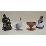 A Royal Copenhagen porcelain goose, together with a Royal Copenhagen sewing girl no 13/14, 162, a