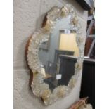 A mid 20th century Venetian glass mirror with gilt highlights