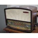 A Bakelite Emerson Radio (lacks a knob), Pilot walnut case radio, 3 other radios (5)