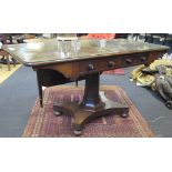 An early Victorian mahogany sofa table, fitted alternate drawers, on a pedestal supoort and bun