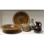 Five Chinese provincial wares, the pair of 15th century northern Thai brown glazed dishes, 21cm (8.