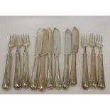 Six pairs of silver handled fish knives and forks, London 1900, 17.7 oz