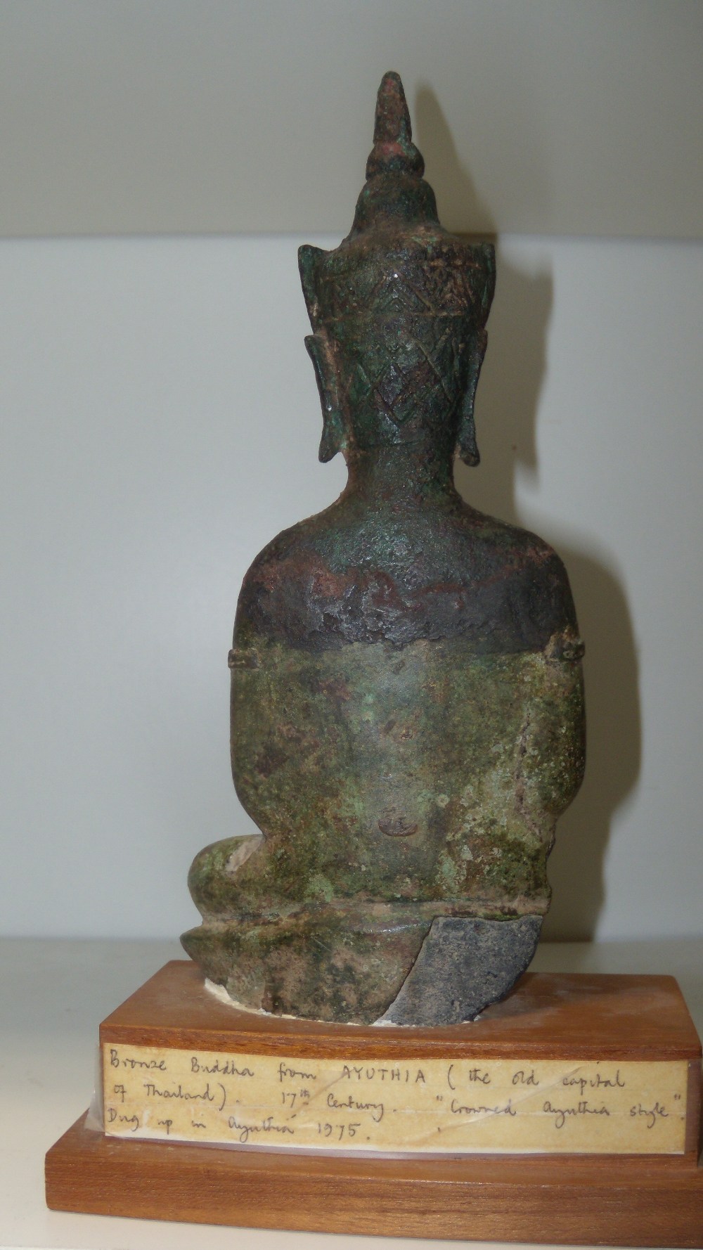 A 16th/17th century bronze Buddha from Ayuthia, Thailand, 20cm (8 in) high  A lable on the wood - Image 2 of 4