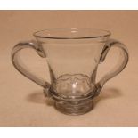 A mid 18th century two handled mug together with a European two handled covered bowl, the thistle