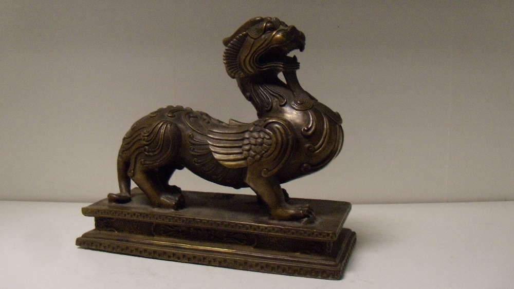 A 20th century Chinese bronze figure of a bixie, 19.5cm (7.75 in) wide  This appears to have been - Image 2 of 3