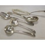 A pair of silver salad servers, London 1846, two silver sauce ladles, London 1870 and a silver