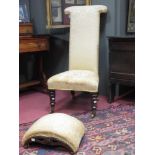 An upholstered prie dieu on mahogany legs, the brass castors stamped Potts, Austin & Smith