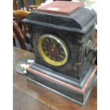 WITHDRAWN - A late Victorian black and pink marble 8 day mantle clock with bronze carrying handles