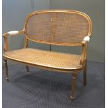 A French style carved gilt salon settee