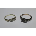 An Edwardian diamond ring set in white and yellow metal, probably 18ct gold (marks worn), size O,