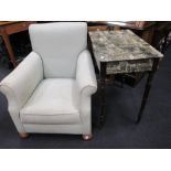A green upholstered armchair, together with an occasional table and a gilt frame (3)