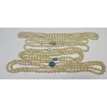 A two strand pearl necklace set with a turquoise cabochon cluster clasp stamped 9ct together with