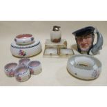 A group of Poole pottery, a Doulton character jug 'Captain Ahab', a Doulton tobacco jar and an