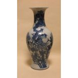 A late 19th century or early 20th century Chinese blue and white vase, 45cm high