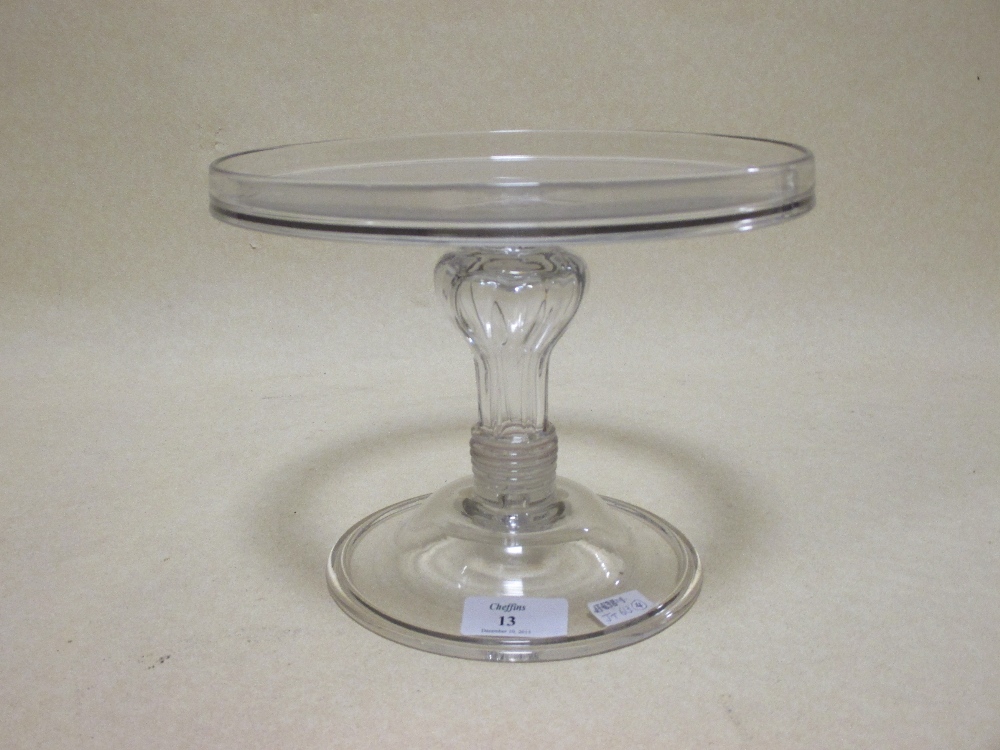A 19th century glass comport, with a dished top, a shaped ring column and stepped foot, 21cm - Image 2 of 3