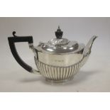 A small silver half fluted teapot, A A Haden, Birmingham 1905, 10.76oz