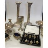 A pair of early 20th century silver column candlesticks and various small silver items, 30oz