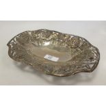 A Victorian silver dish, the pierced grape vine border with repousse decoration, 22cm long, 6oz