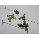 A 9ct gold frog brooch set with green hardstone eyes, Sheffield 1990, together with two green