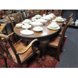 An early 20th century mahogany extending dining table, 180 cm when extended, and six George III