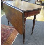 A George IV mahogany side table, with single drop leaf on triple ring turned legs, 72cm high, 91cm