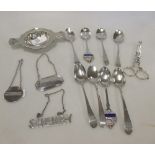 Six George III silver teaspoons, various makers and dates, a pair of late Victorian sugar nips, a