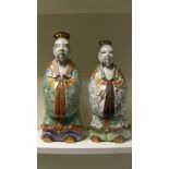 A pair of early 20th century Kutani temple figures, 37cm (14.5 in) high (2)  The bearded dignitary