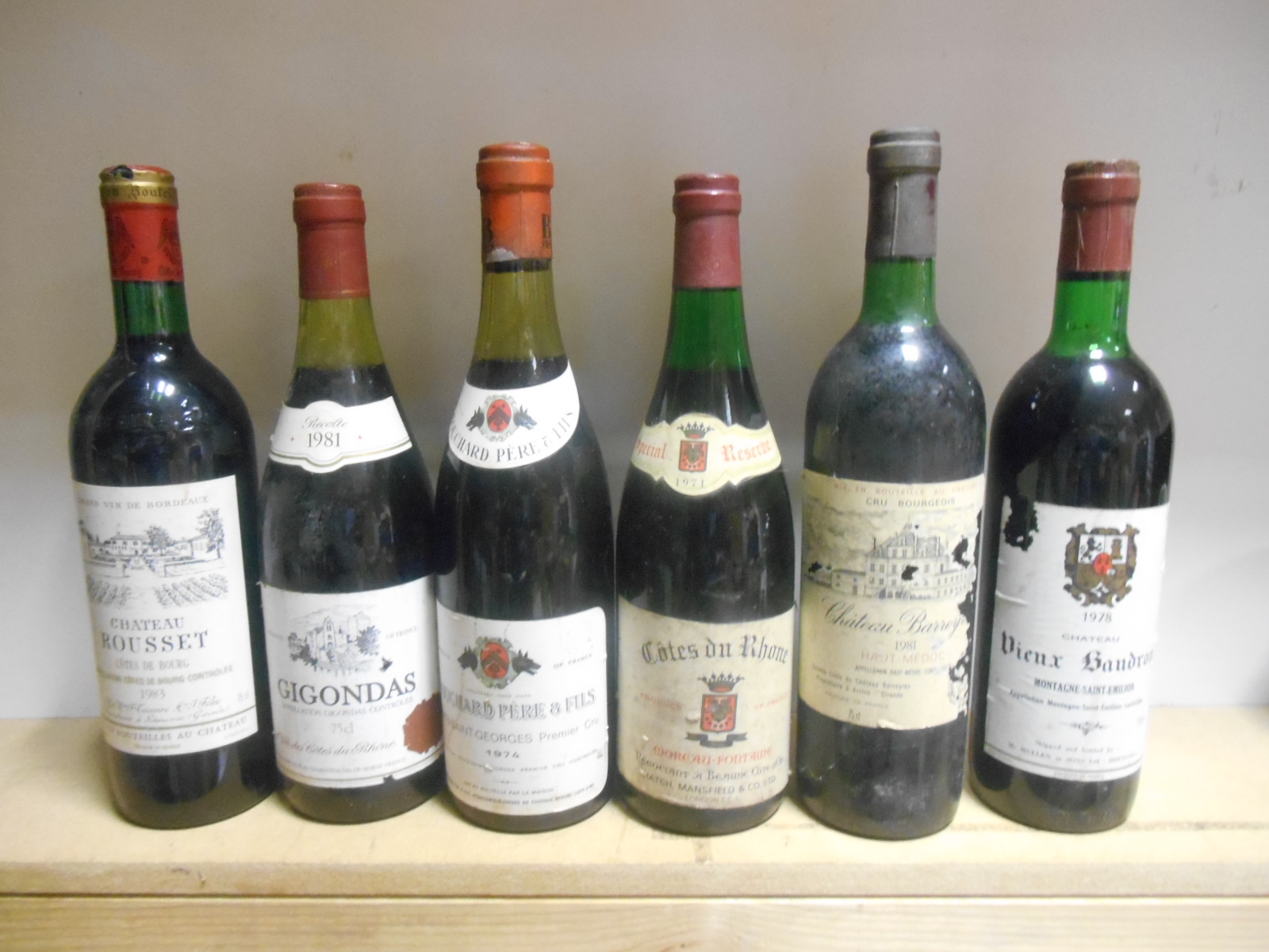 Twelve mixed bottles: Chateau La Dominique, St Emilion Grand Cru 1988; Chateau Coufran, Haut Medoc