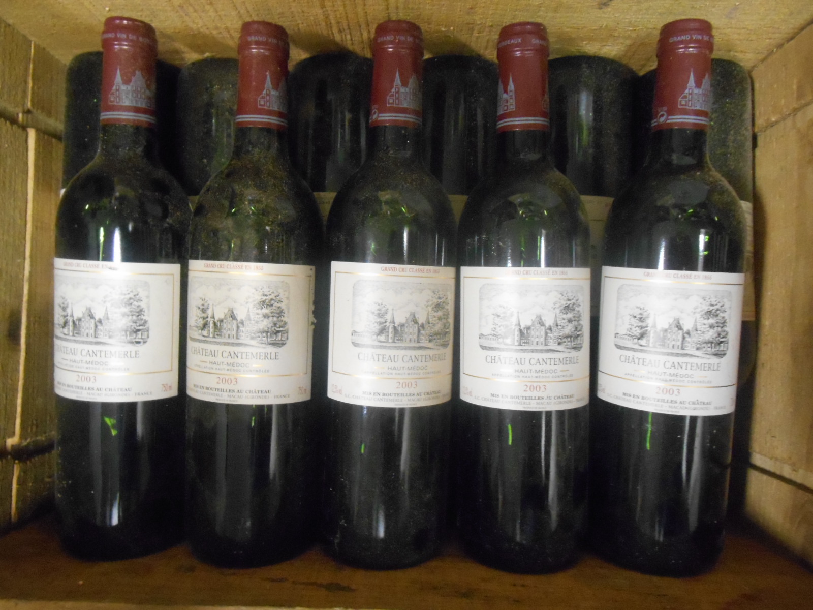 Chateau Cantemerle, Haut Medoc 5eme Cru 2003, eleven bottles in opened wooden case the vendor