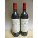 Chateau La Lagune, Haut-Medoc 3eme Cru 1985, two bottles (levels very top shoulder); together with