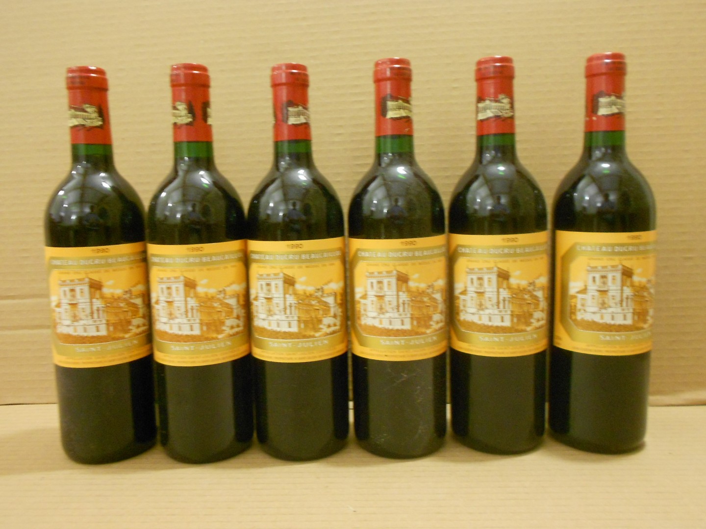 Chateau Ducru Beaucaillou, St Julien 2eme Cru 1990, twelve bottles. Removed from a college cellar