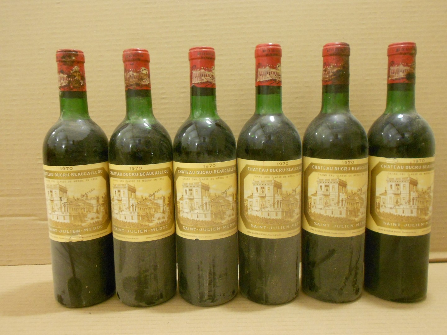 Chateau Ducru Beaucaillou, St Julien 2eme Cru 1970, twelve bottles. Removed from a college cellar.