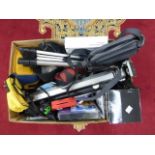 A box of camera accessories and equipment including cases, tripods etc.