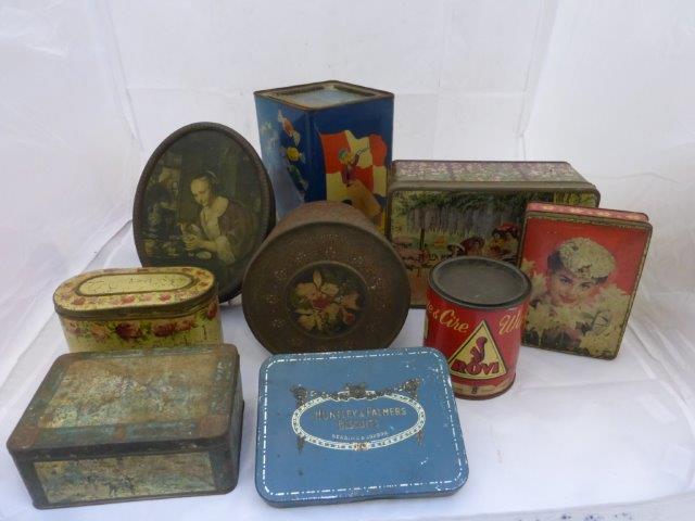 A quantity of assorted tins.