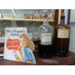 A Milk of Magnesia tablets easel pictorial showcard and two Wilkinson & Simpson Limited chemist